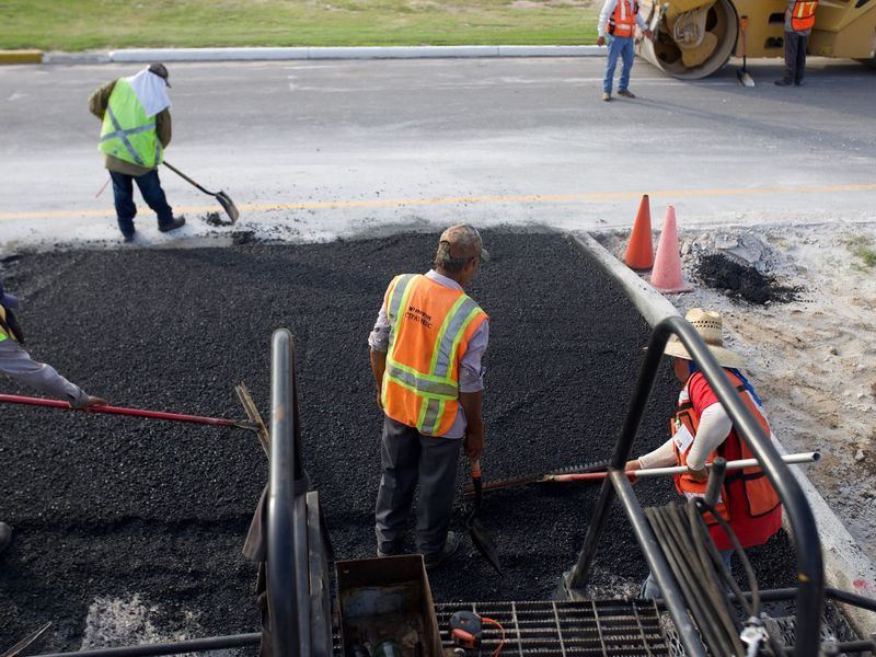 Asphalt paving and sealcoating job near Fairfax, IA